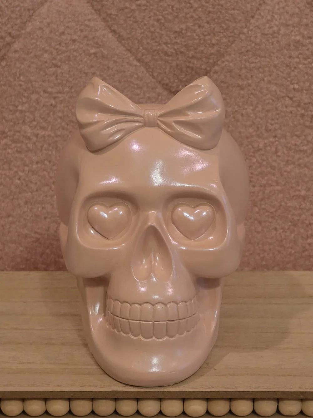 Bow Accent Heart-Eye Skull Figurine in Blush Pink
